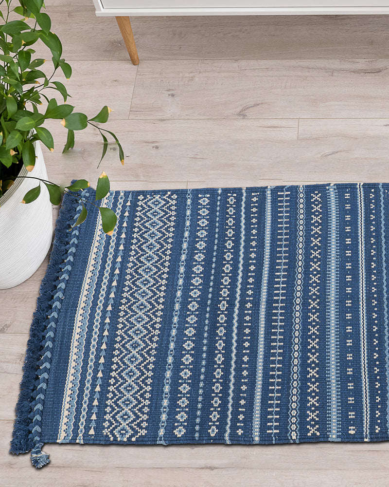Deepblue handwoven rug is one of the options for living room rugs by HeritageBox india
