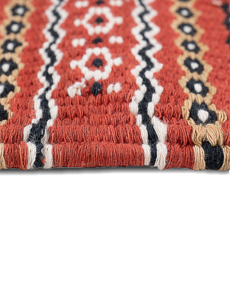 Rosso Corsa Handwoven Rug is one of the options for living room rugs by HeritageBox india